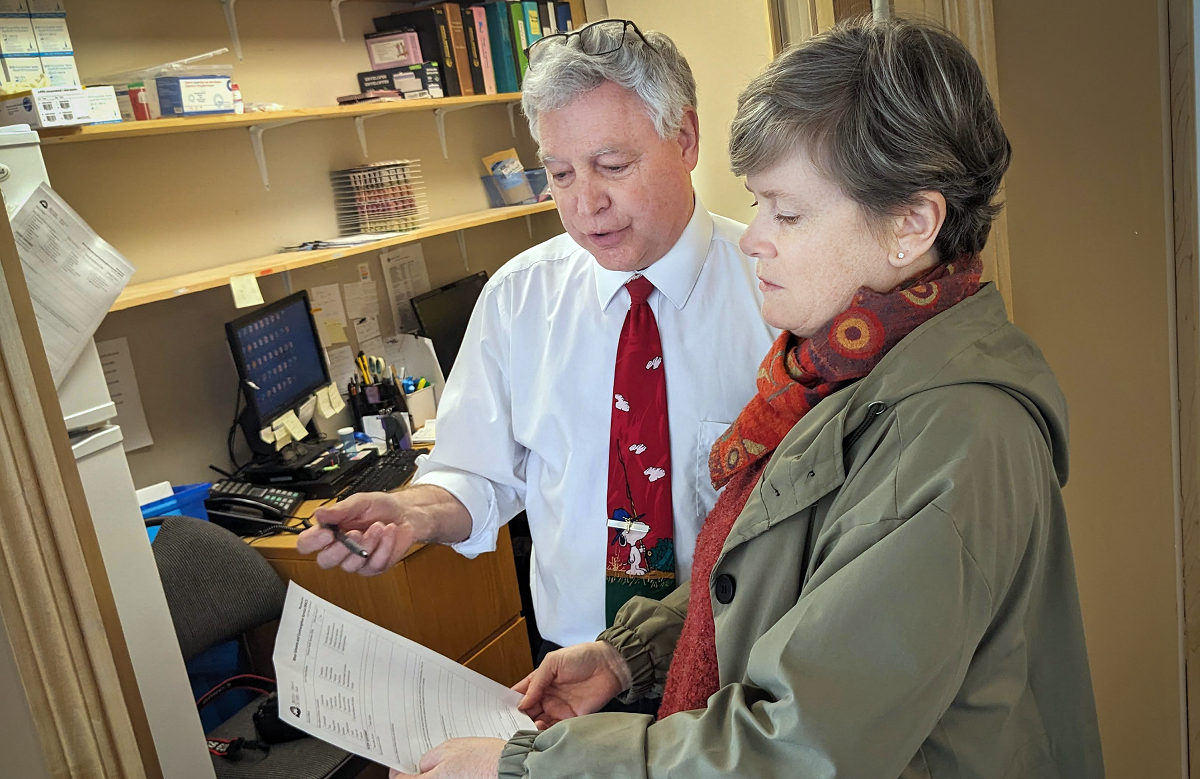 Larry Johannessen, owner of Medicine Shoppe #253, speaks with MLA Josie Osborne, Minister of Energy and Mines for B.C., about the importance of rural pharmacies to communities like Port Alberni.