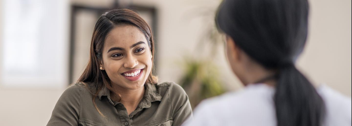 Patient talking to pharmacist