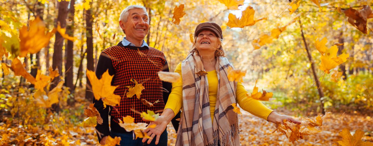 Seniors in Fall with leaves
